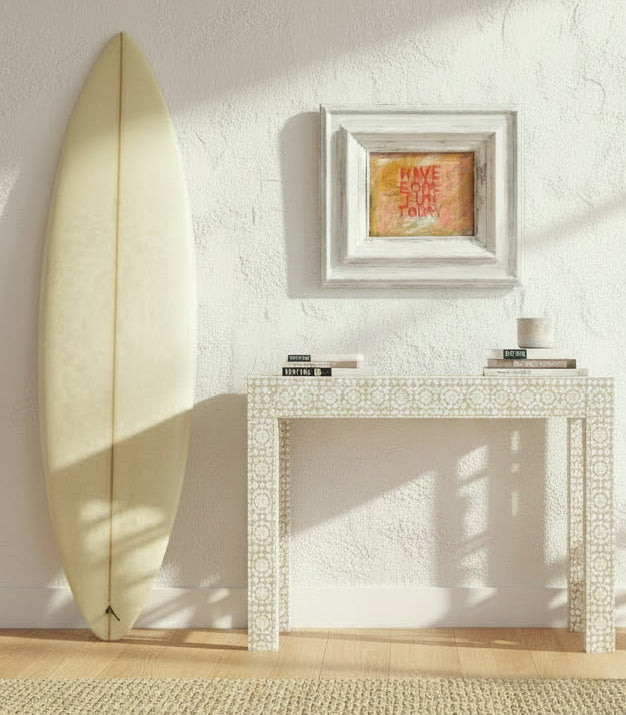 Framed artwork with 'Have Some Fun Today' text on a textured background