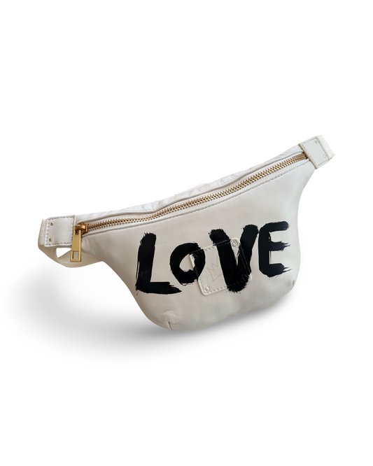 White fanny pack with 'LOVE' printed in black on a white background