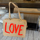 Neon Orange LOVE Elsie Bag by Stephanie Rado Taormina
